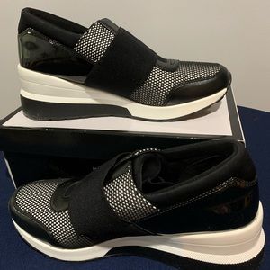 New wedge tennis shoe like by Michael Kors.